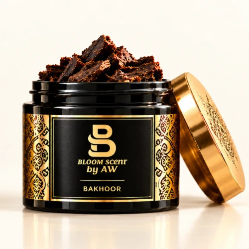 Bloom Scent Bakhoor product display with black and gold jars, oud wood and traditional Arabian incense burner